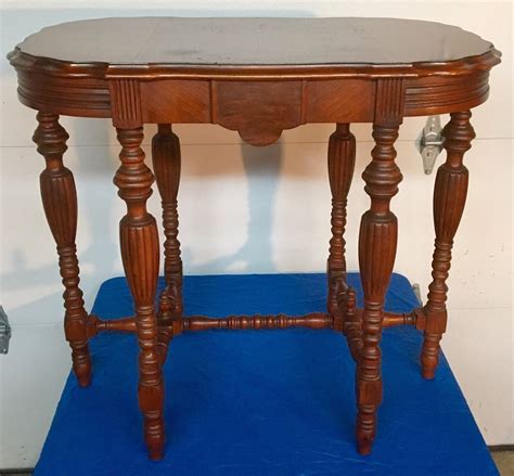 Spindle Spool Drop Leaf <b>Table</b>. . Antique 6 legged parlor table